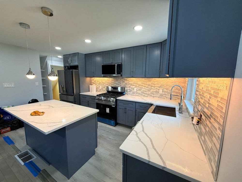 under cabinet LED task lighting illuminating kitchen countertop work surface